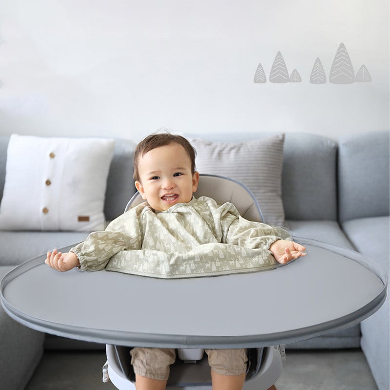 Bandeja impermeable con babero para la alimentación del bebé y desordenes