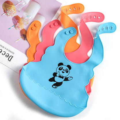 Babero de silicona de grado alimenticio para bebé con bolsillo para la saliva.