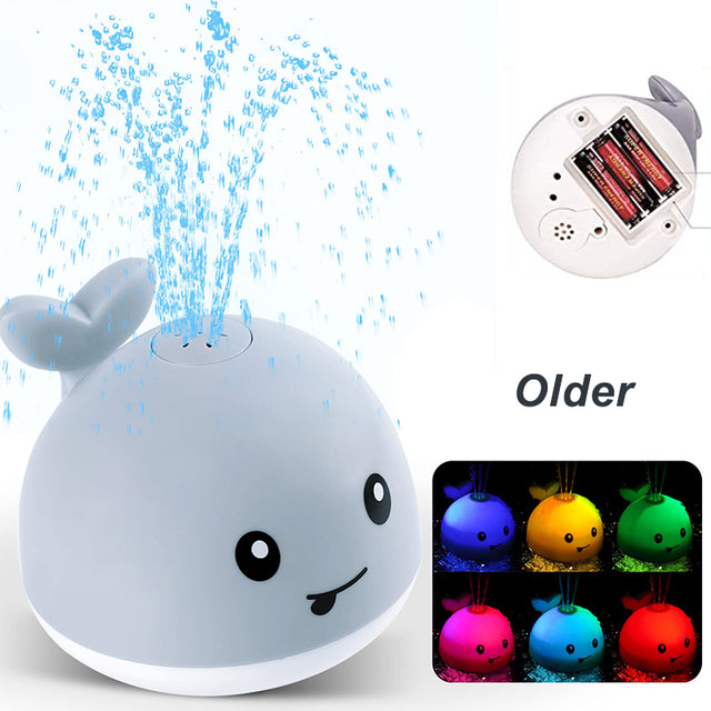 Juguetes de baño de dinosaurio con rociador de agua automático y luz