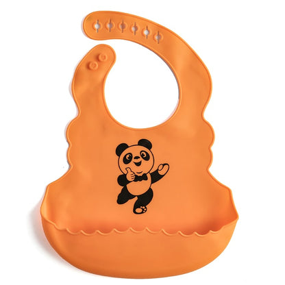 Babero de silicona de grado alimenticio para bebé con bolsillo para la saliva.